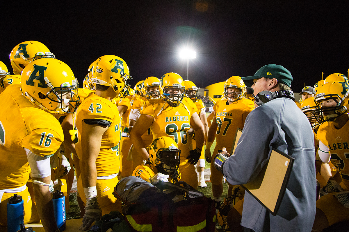 Head coach Chris Morris attempts to rally his team late in the fourth quarter.