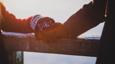 winter date holding hands